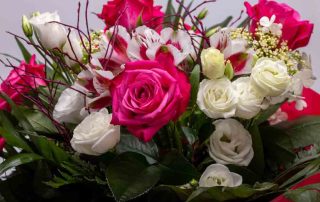 beautiful florist bouquet of roses and freesias